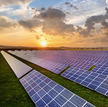 Solar energy panels at sunset